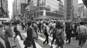 People Crossing a Busy Street